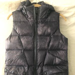 Black sleeveless puffer with hood